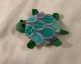 Blue and green turtle finger puppet