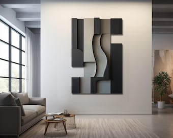 May include: Abstract wall art sculpture with geometric shapes in shades of gray and black. The sculpture is made of multiple layers of material, creating a three-dimensional effect.