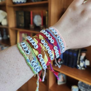 Hozier - Cherry Wine, Too Sweet, From Eden, Unreal Unearth inspired knotted bead friendship bracelets. Wear and share at concerts! CHARMS