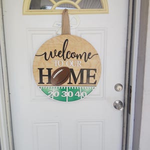 Welcome football door hanger sign