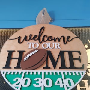Welcome football door hanger sign