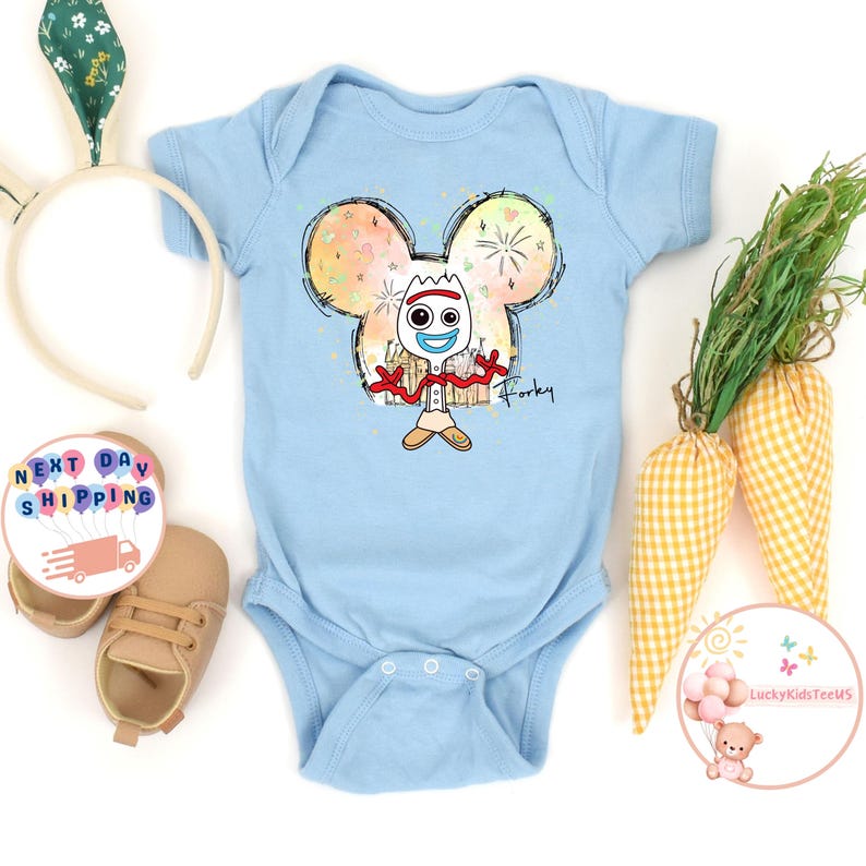 May include: Light blue baby bodysuit featuring a cartoon illustration of Forky from Toy Story within a Mickey Mouse silhouette. The illustration is surrounded by colourful fireworks and the word "Forky" is written below.