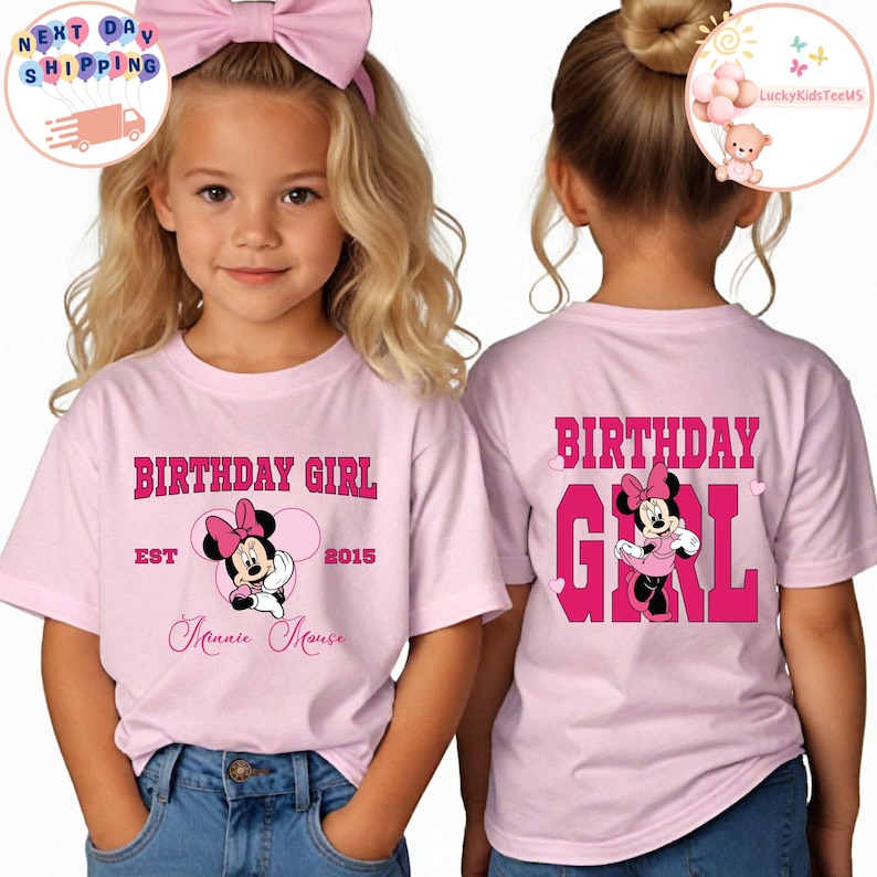 May include: Two pink t-shirts with a Minnie Mouse graphic and the text "Birthday Girl". One shirt has the text "EST 2015 Minnie Mouse" and the other shirt has the text "Birthday Girl" in large pink letters.