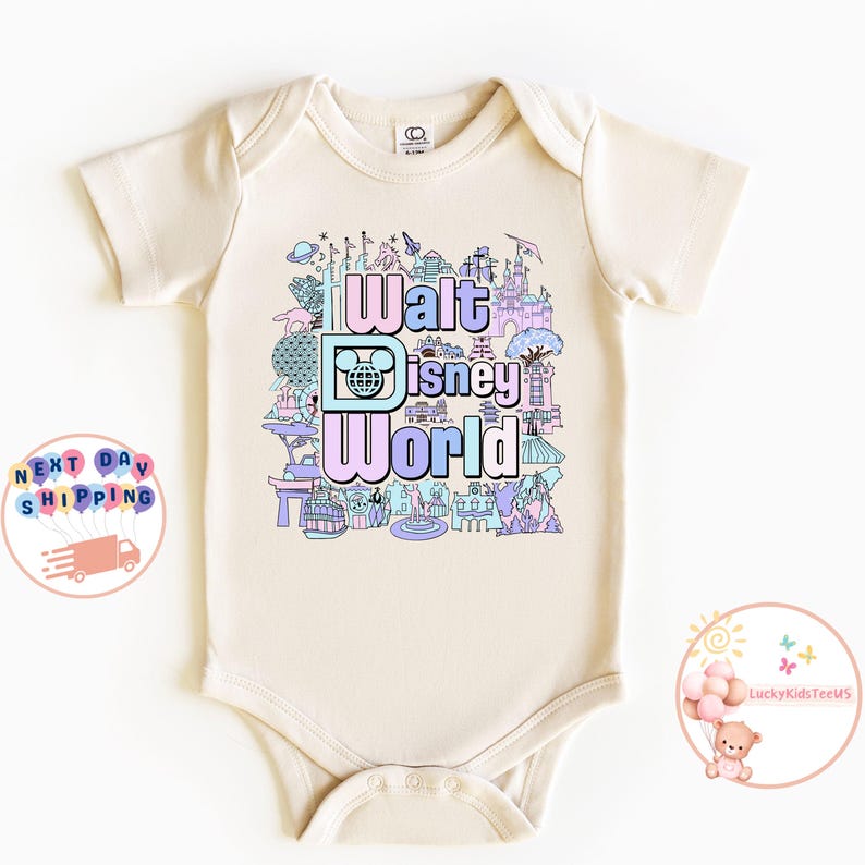 May include: A cream-colored baby onesie with a colorful graphic of Walt Disney World landmarks and the text "Walt Disney World".