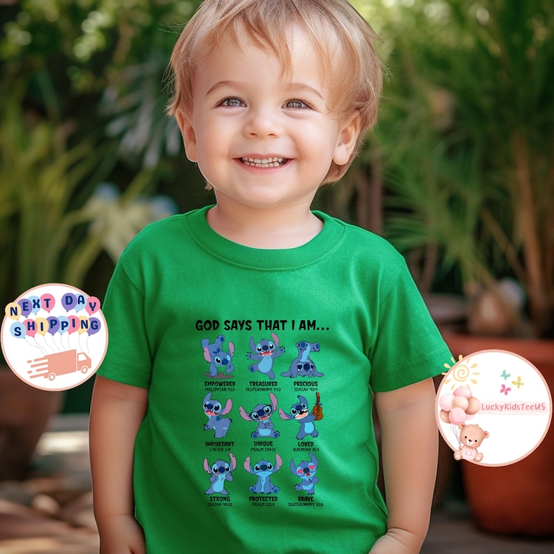 May include: A green t-shirt with a blue cartoon character on it. The shirt says "God says that I am..." and lists a series of positive attributes, each with a different pose of the cartoon character.