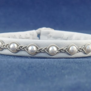 SwedArt B21-P XXS Reduced, Snowball Pearl, White Lambskin, Sterling Silver Button, Pewter and Silver Braids White