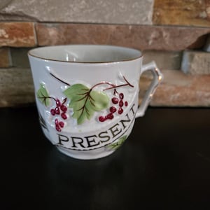Victorian German tea cup with PRESENT written on cup