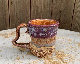 ceramic mug in copper and purple