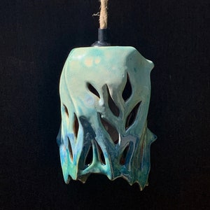 carved ceramic pendant lamp