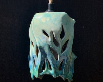 carved ceramic pendant lamp