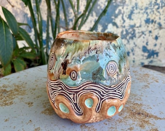 ceramic planter in blues and greens