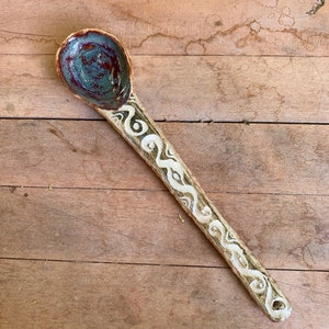 carved ceramic spoon in red and tourmaline