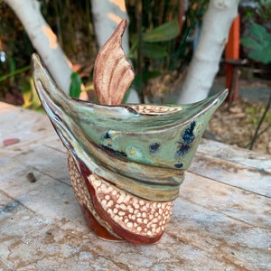 ceramic green stoppered vial