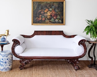 Antique Carved Mahogany Sofa with Crisp White Upholstery