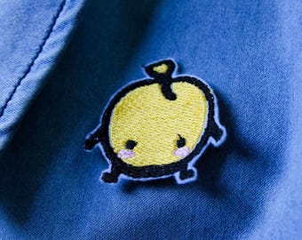 Cuci/stira Stardew Valley Junimo in rosso, giallo e rosa, adatto ai vegani
