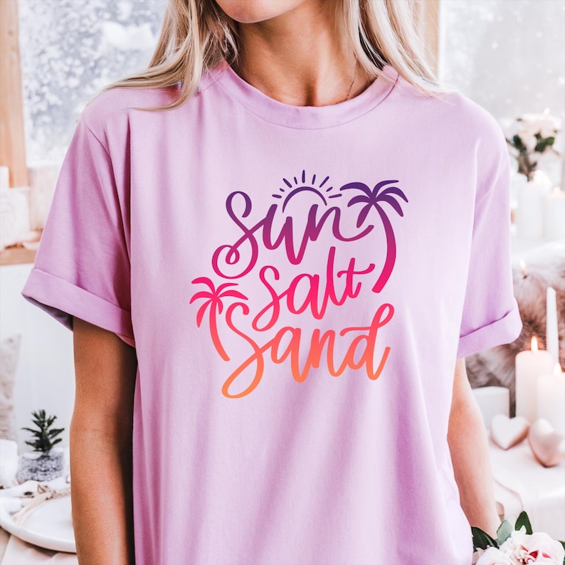 Heather prism lilac summer shirt with gradient lettering sun salt sand graphic tee.