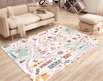 May include: A white play mat with a colorful city and nature scene. The mat features a road, buildings, trees, animals, and a rainbow. The mat is non-slip, durable, and washable.