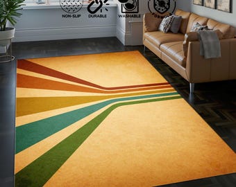 May include: A retro-style area rug with a beige background and multicolored stripes. The stripes are in shades of brown, orange, yellow, green, and blue. The rug has a faded, vintage look.