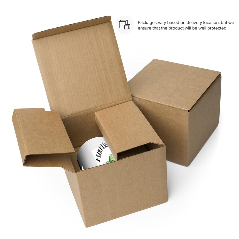 May include: A white ceramic mug with the text "Espresso" and a green leaf design. The mug is packaged in a brown cardboard box.