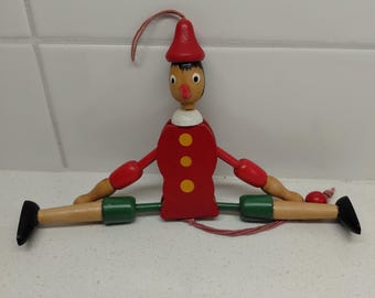 Vintage Pinocchio jumping jack puppet. Toy, decor, Christmas
