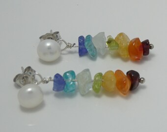 Chakra gemstone drops on pearl stud earrings.