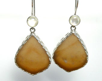 Mother of Pearl and Petrified Wood earrings.