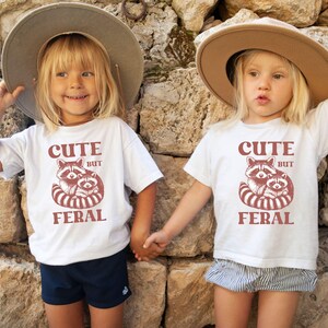 Cute But Feral Raccoon Toddler Shirt, Raccoon Lover Gift, Retro Feral Kid Tshirts, Trendy Raccoon Kids Tee, Cute Raccoon Lover Bodysuits, Boho Natural Kids Toddler Youth Tee, Sarcastic Snark Racoon Shirt, Funny Quote Women's Tee, Christmas Raccoon