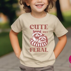 Cute But Feral Raccoon Toddler Shirt, Raccoon Lover Gift, Retro Feral Kid Tshirts, Trendy Raccoon Kids Tee, Cute Raccoon Lover Bodysuits, Boho Natural Kids Toddler Youth Tee, Sarcastic Snark Racoon Shirt, Funny Quote Women's Tee, Christmas Raccoon