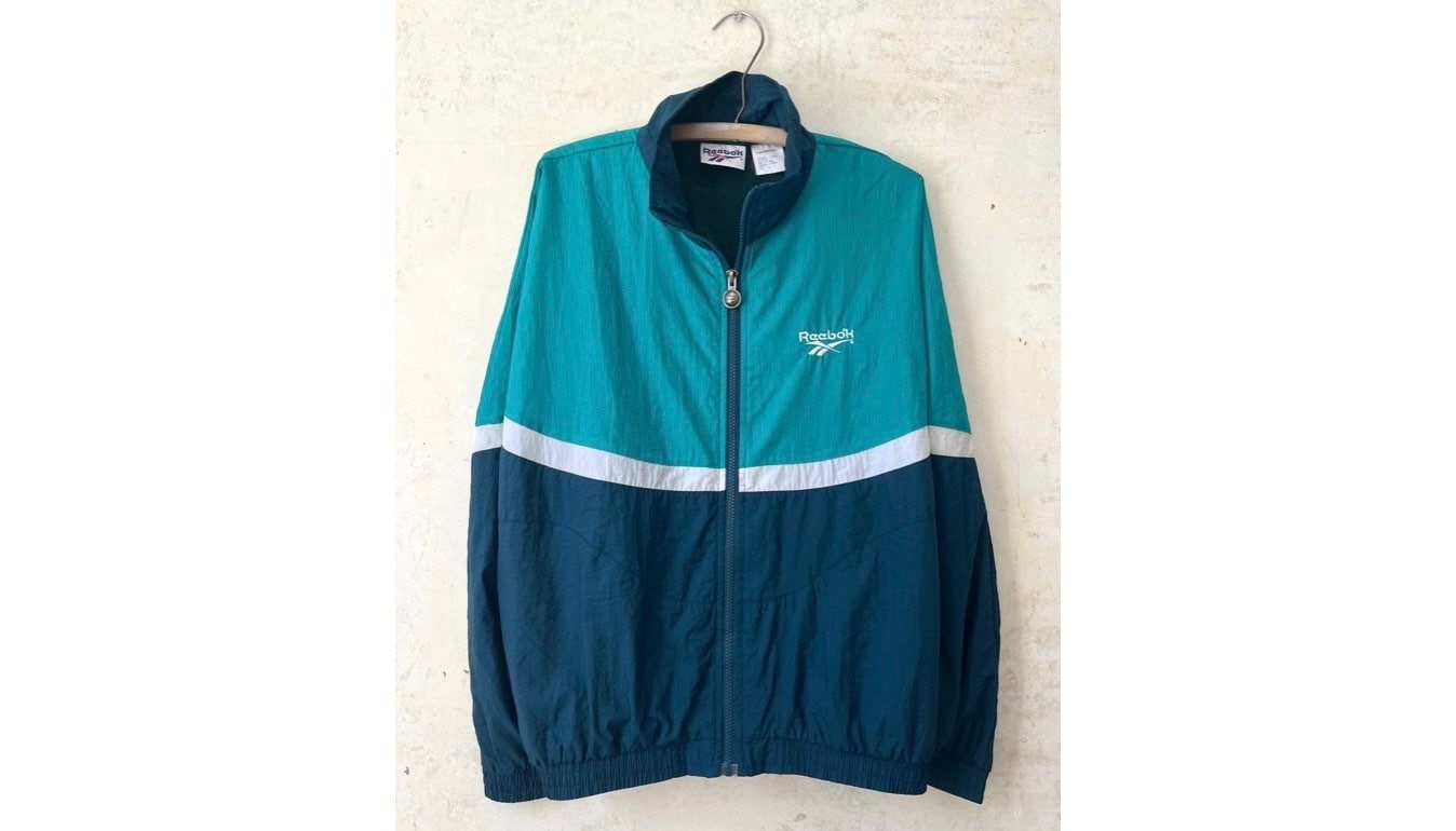 Vintage 80’s 90’s Reebok Teal Colorblock Stripe Raglan Nylon Jacket Windbreaker sz 46” Chest Md Lg