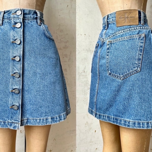 Vintage 90’s Calvin Klein Denim Button Front A-Line Mini Skirt sz 27” Waist Sm