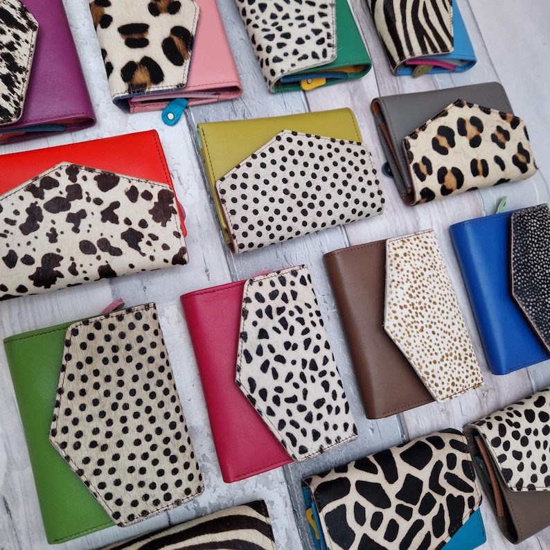 May include: A set of three ceramic mugs with a speckled, matte finish in cream, light brown, and dark brown. Each mug has a simple, minimalist design, ideal for tea or coffee.