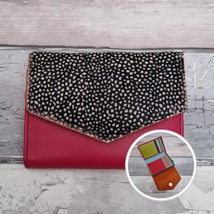 May include: A trio of ceramic mugs with a speckled, matte finish in cream, light grey, and dark grey. Each mug features a minimalist design and a rounded handle.