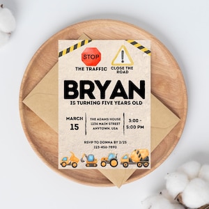 May include: Construction themed birthday party invitation with a yellow and black striped background. The invitation says "STOP THE TRAFFIC" and "CLOSE THE ROAD" with a construction sign and stop sign. The invitation is for Bryan's 5th birthday party on March 15th from 3:00 PM to 5:00 PM at The Adams House, 1234 Main Street, Anytown, USA. RSVP to Donna by 2/25 at 123-456-7890.