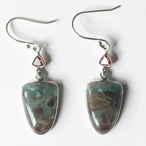 Aquamarine in Sunstone earrings with Garnets in sterling silver frames.