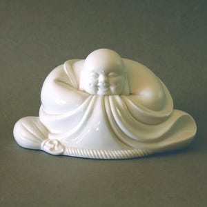 Happy Buddha Figurine for wisdom and contentment.