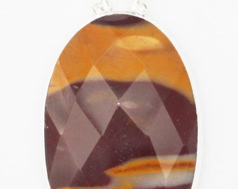 Faceted Mookaite Pendant in oval Sterling Silver frame for wealth and success.