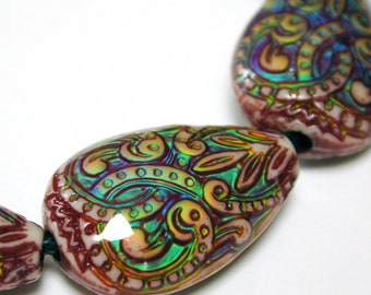 Fancy Flame Strand of Ten Color Changing Mirage Beads