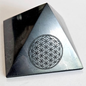 Shungite Pyramid with engraved Flower of Life 30mm base (2.16 inch)
