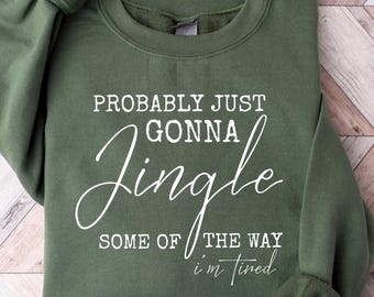 Sudadera "Probablemente solo voy a tintinear en algún lugar del camino", divertida camiseta navideña, atuendo acogedor para mamá cansada, camiseta con humor navideño, idea de regalo de Navidad