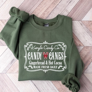Retro Weihnachten Sweatshirt, Weihnachtssüßigkeiten Sweatshirt, Kringle Candy Co. Shirt, Candy Cane Shirt, Weihnachten Rundhalsausschnitt, Einzigartiges Weihnachtsgeschenk