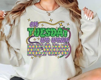 Le mardi, nous portons un pull en perles, un sweat-shirt rétro de mardi gras, des vêtements de carnaval de mardi gras, une chemise de perles colorées amusantes, une tenue unique de mardi gras
