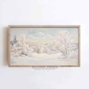 May include: A framed painting of a snowy winter landscape with trees covered in frost. The painting is in a light wood frame and has a light blue sky with white clouds.