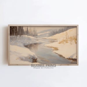 May include: A framed painting of a winter landscape with a winding river flowing through a snowy forest. The painting is in a light wood frame and has a white background.