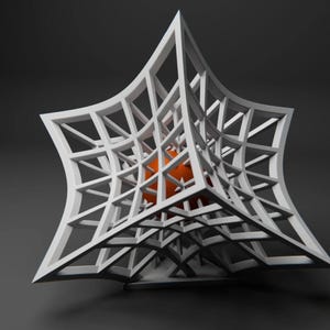 May include: A white, geometric, star-shaped sculpture with a sphere inside. The sphere is orange and white.