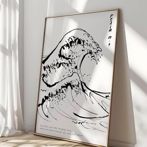 May include: Black and white ink illustration of a large wave crashing. The text "PSALM 8:9" and "You rule over the surging sea; when its waves mount up, you still them." is printed below the wave. The image is framed in a gold frame.