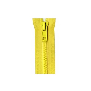 May include: A bright yellow zipper with a metal slider.