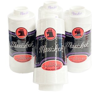 May include: Three white spools of Maxi-Lock All Purpose Spun Polyester Serger Thread. The spools have a black and purple label with the brand name and product description.