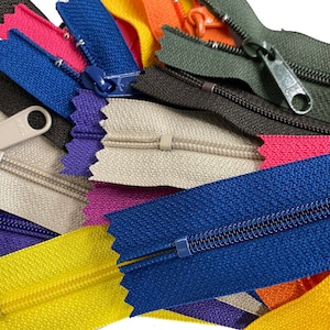 May include: Assortment of zipper tapes in various colors, including yellow, blue, purple, pink, beige, and green. The zippers are made of nylon and have a smooth finish.
