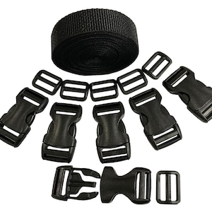 May include: A set of black plastic buckles and straps for crafting. The set includes 7 buckles, 5 slider buckles, and 1 roll of black webbing.