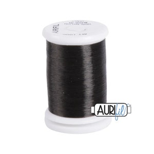 May include: A spool of black nylon thread, 100% nylon, made in Italy. The spool is labeled "Aurifil" and has a white label with the text "100% Nylon Made in Italy".